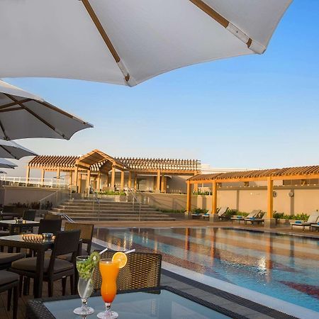 Ayla Grand Hotel Al Ain Exterior photo The pool at the hotel