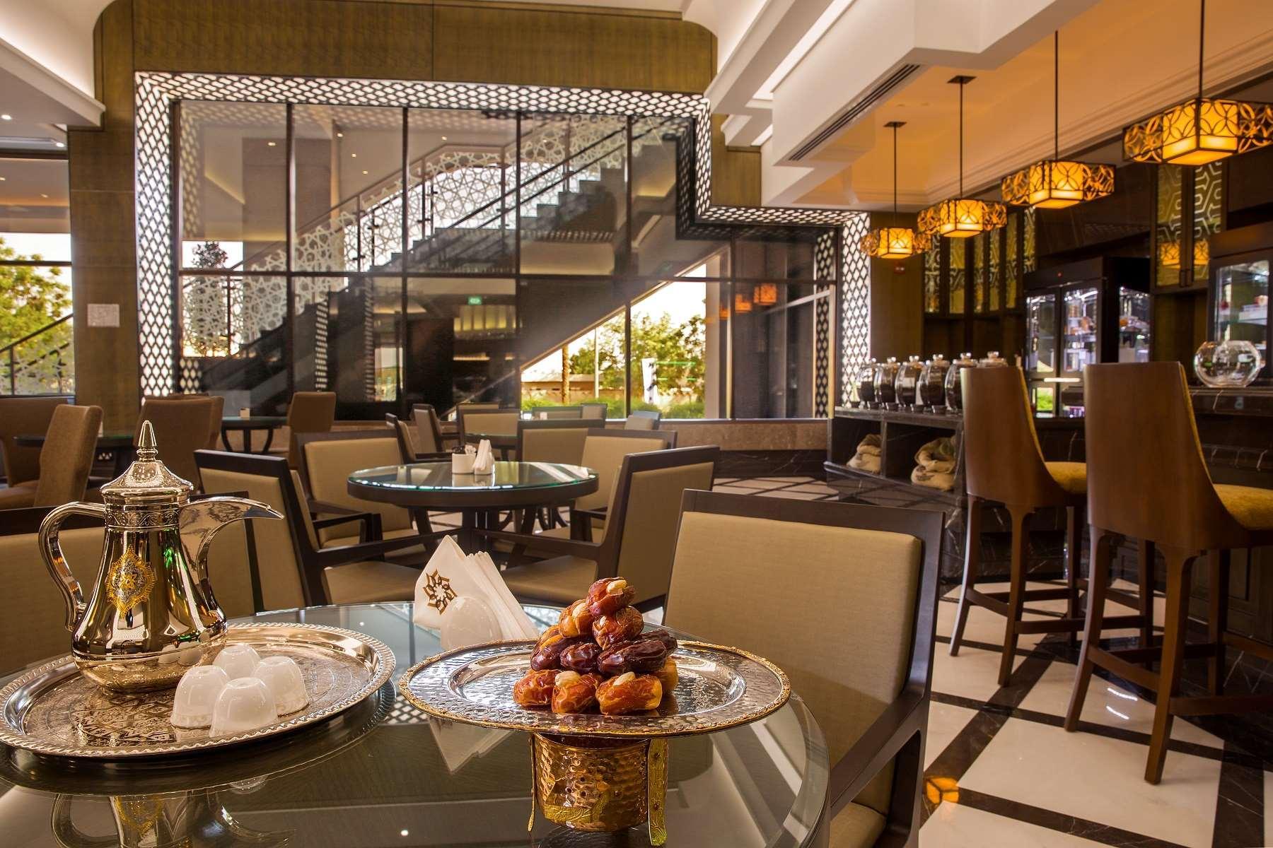 Ayla Grand Hotel Al Ain Exterior photo The interior of the restaurant