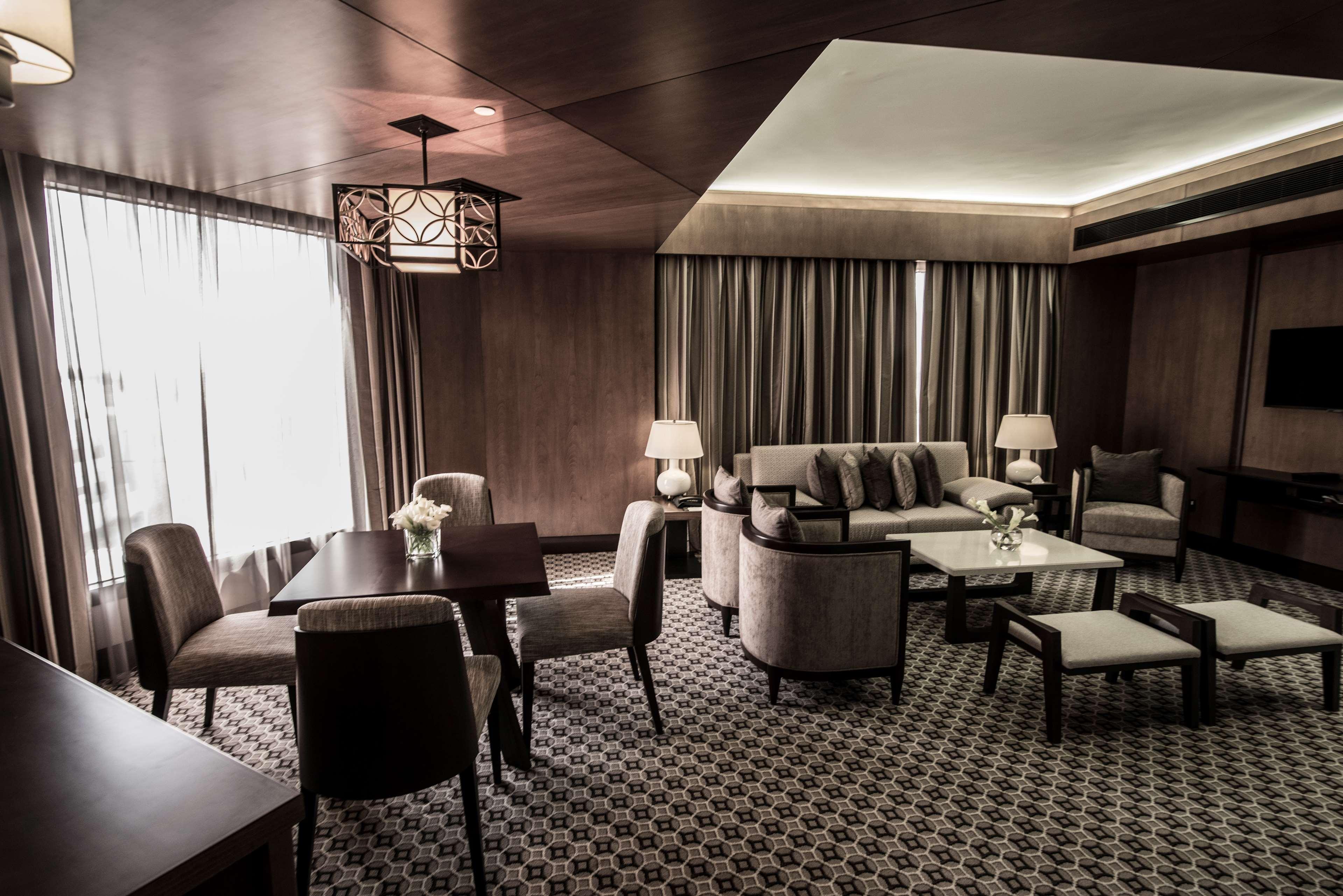 Ayla Grand Hotel Al Ain Exterior photo The interior of a suite