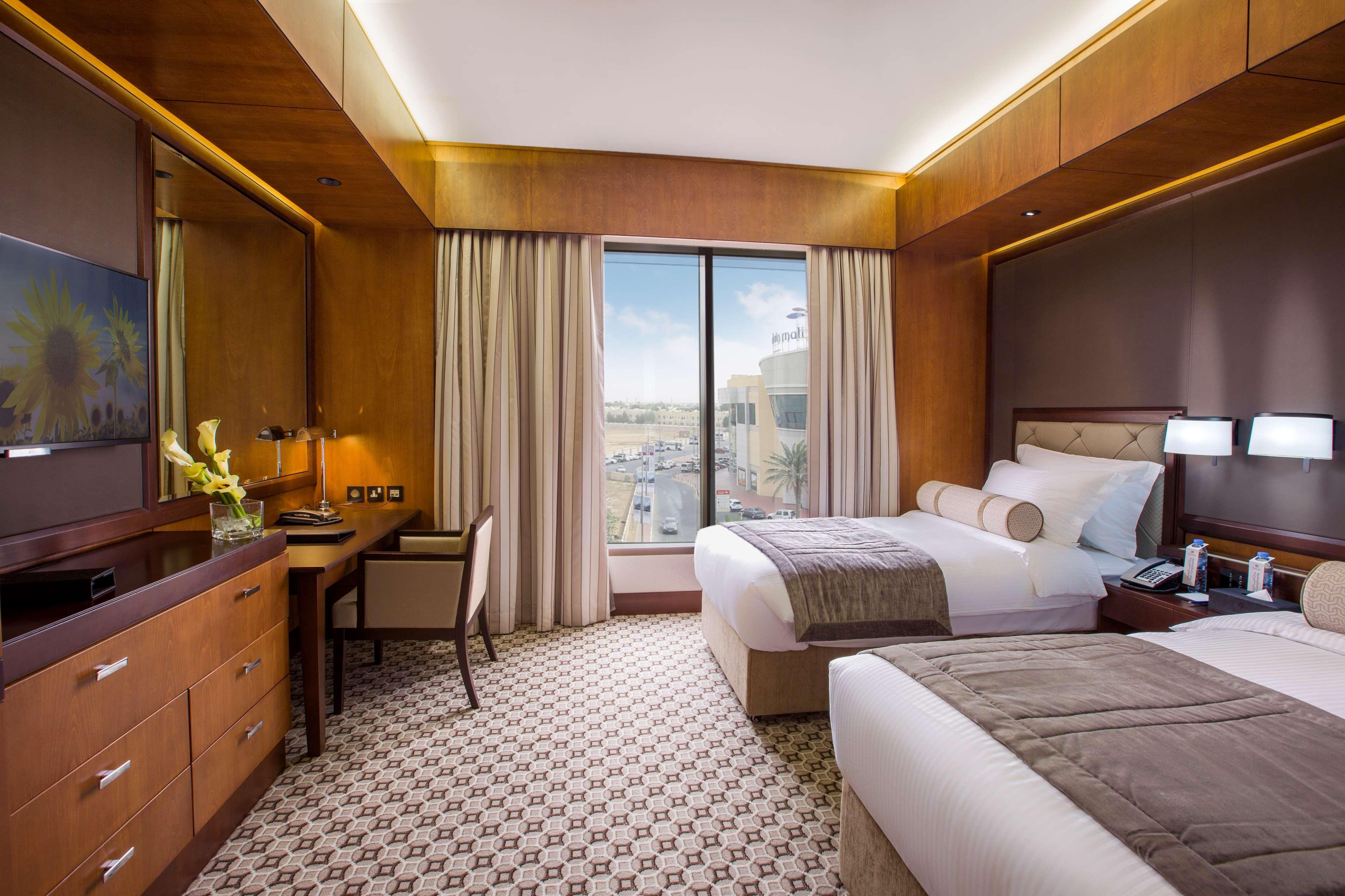 Ayla Grand Hotel Al Ain Exterior photo Deluxe Room