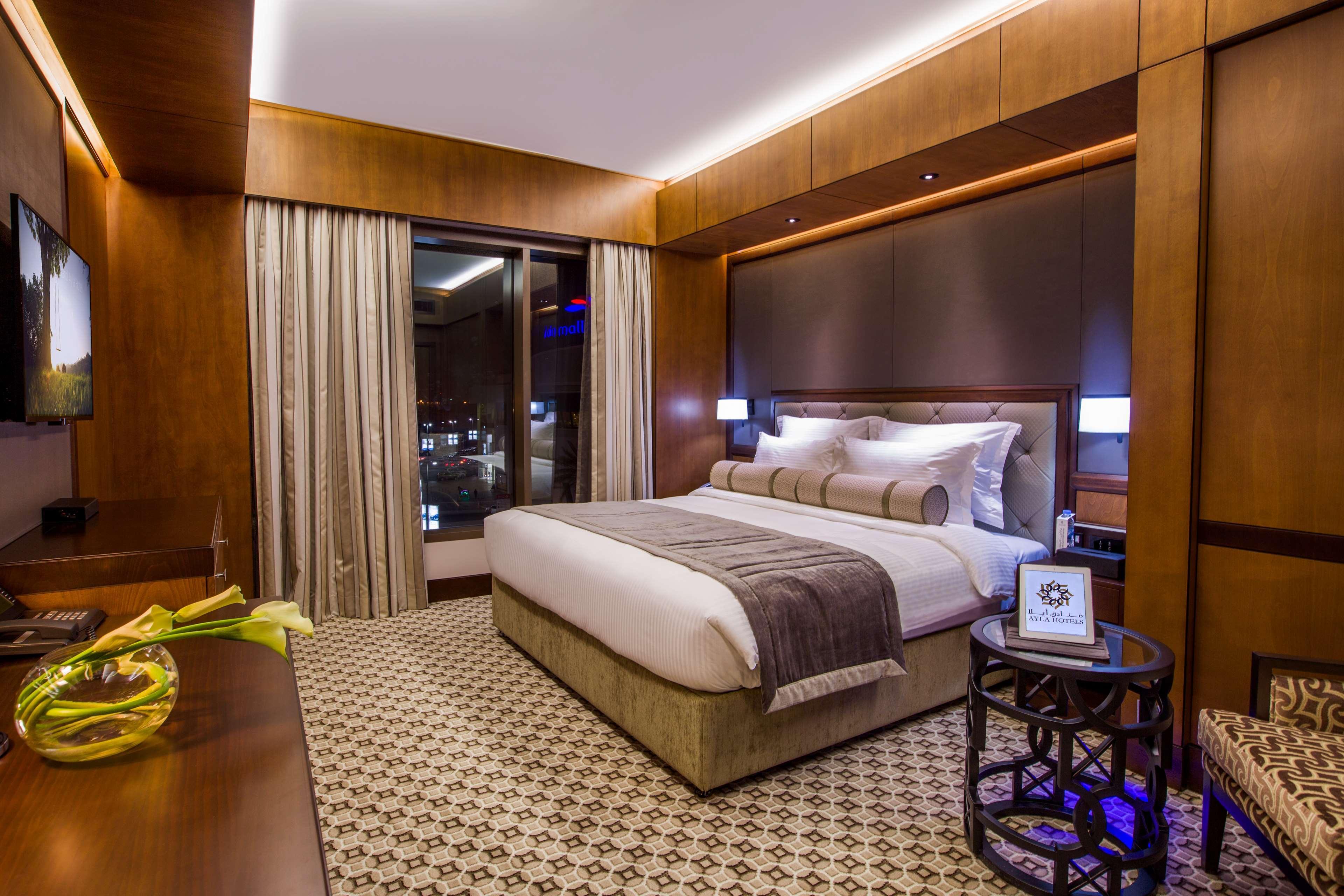 Ayla Grand Hotel Al Ain Exterior photo A bedroom at the hotel