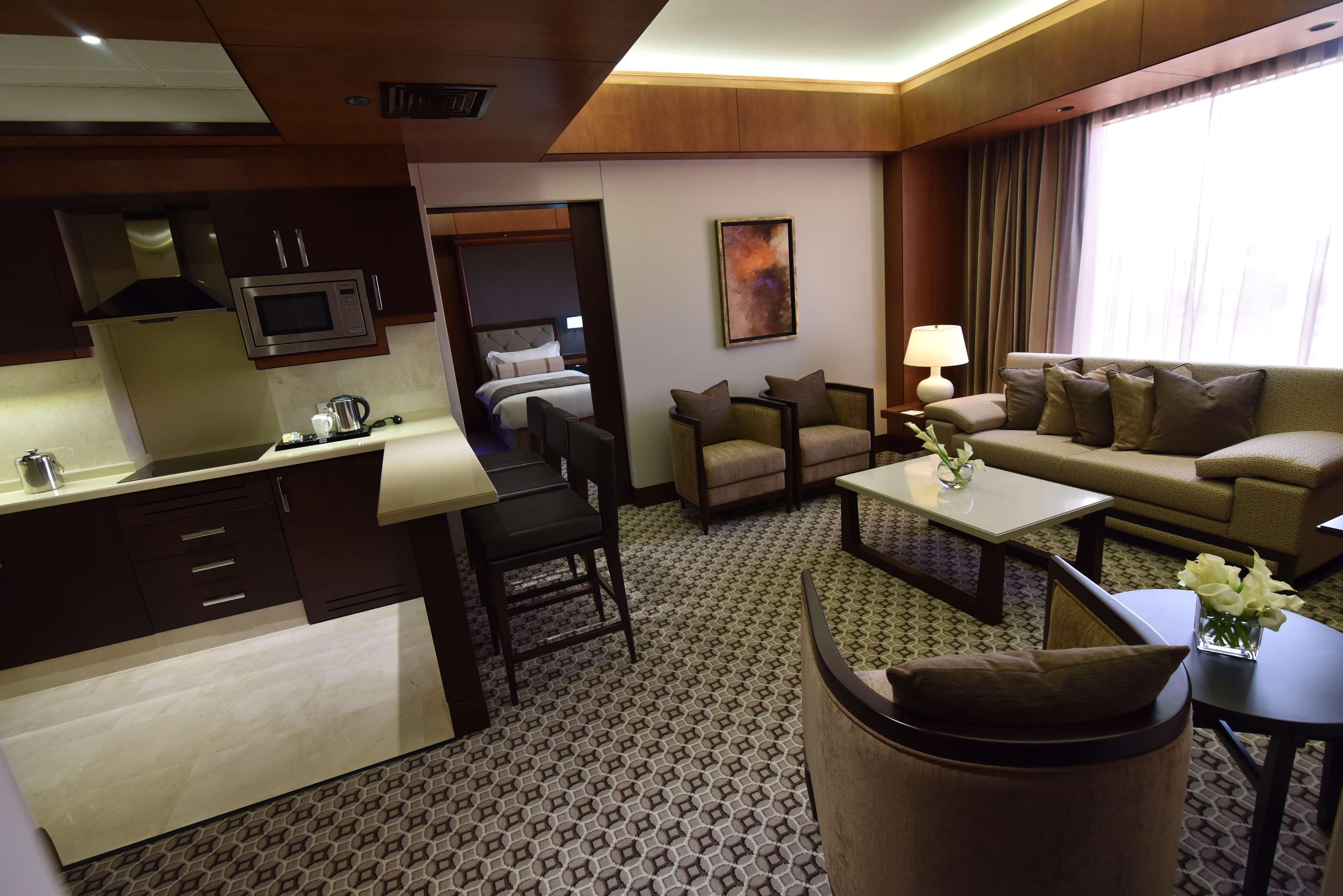 Ayla Grand Hotel Al Ain Exterior photo A suite at the hotel