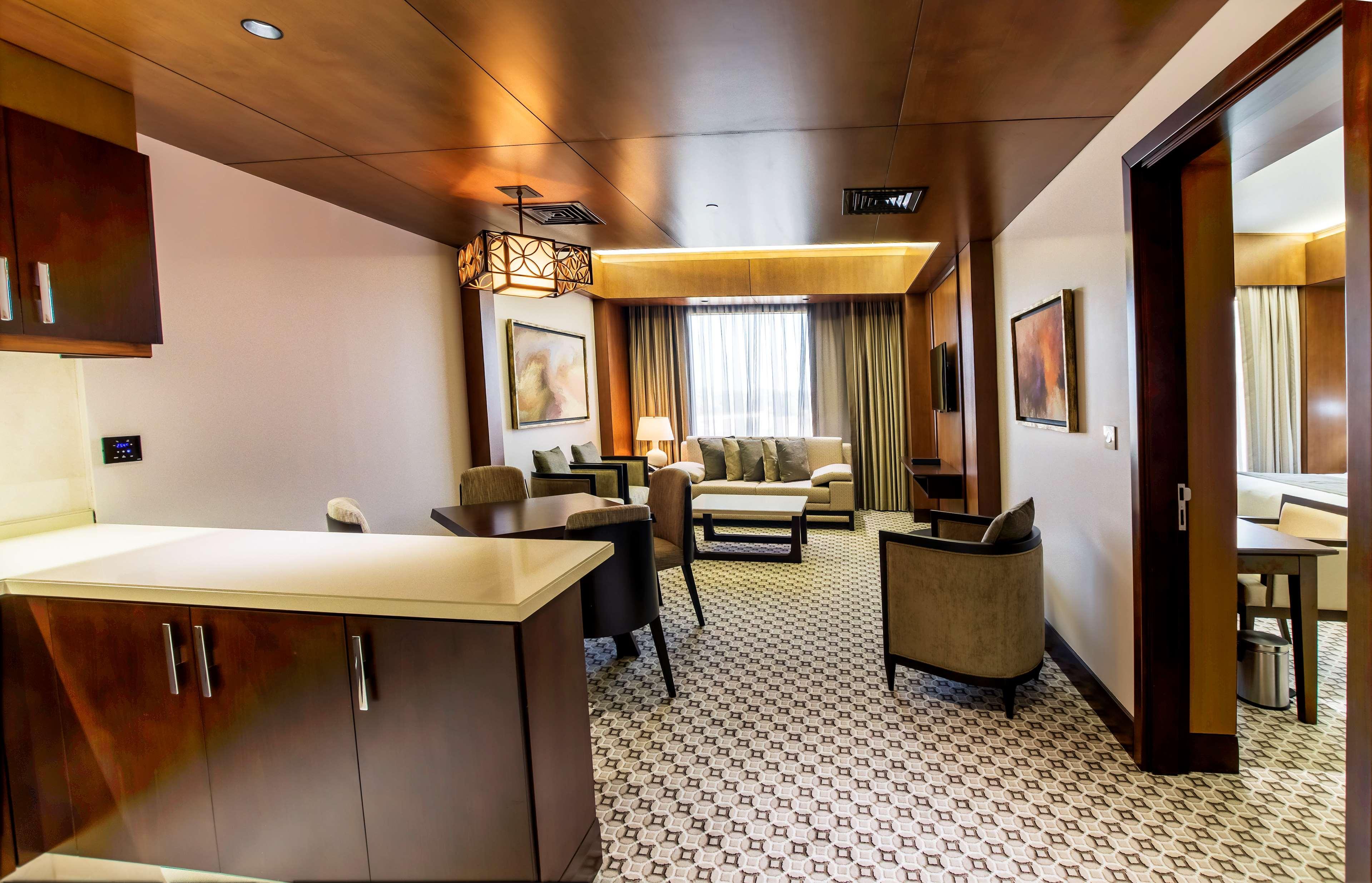 Ayla Grand Hotel Al Ain Exterior photo A suite at the hotel